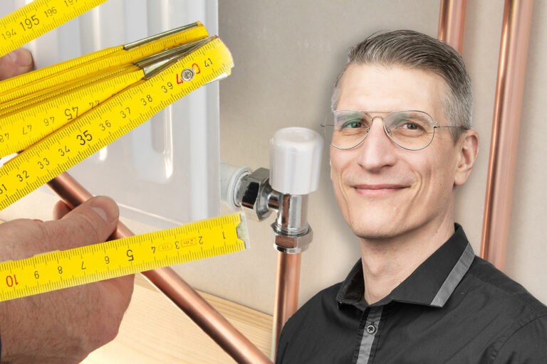 Hand och tumstock vid radiator. Björn Wettervik, VVS-teknikexpert